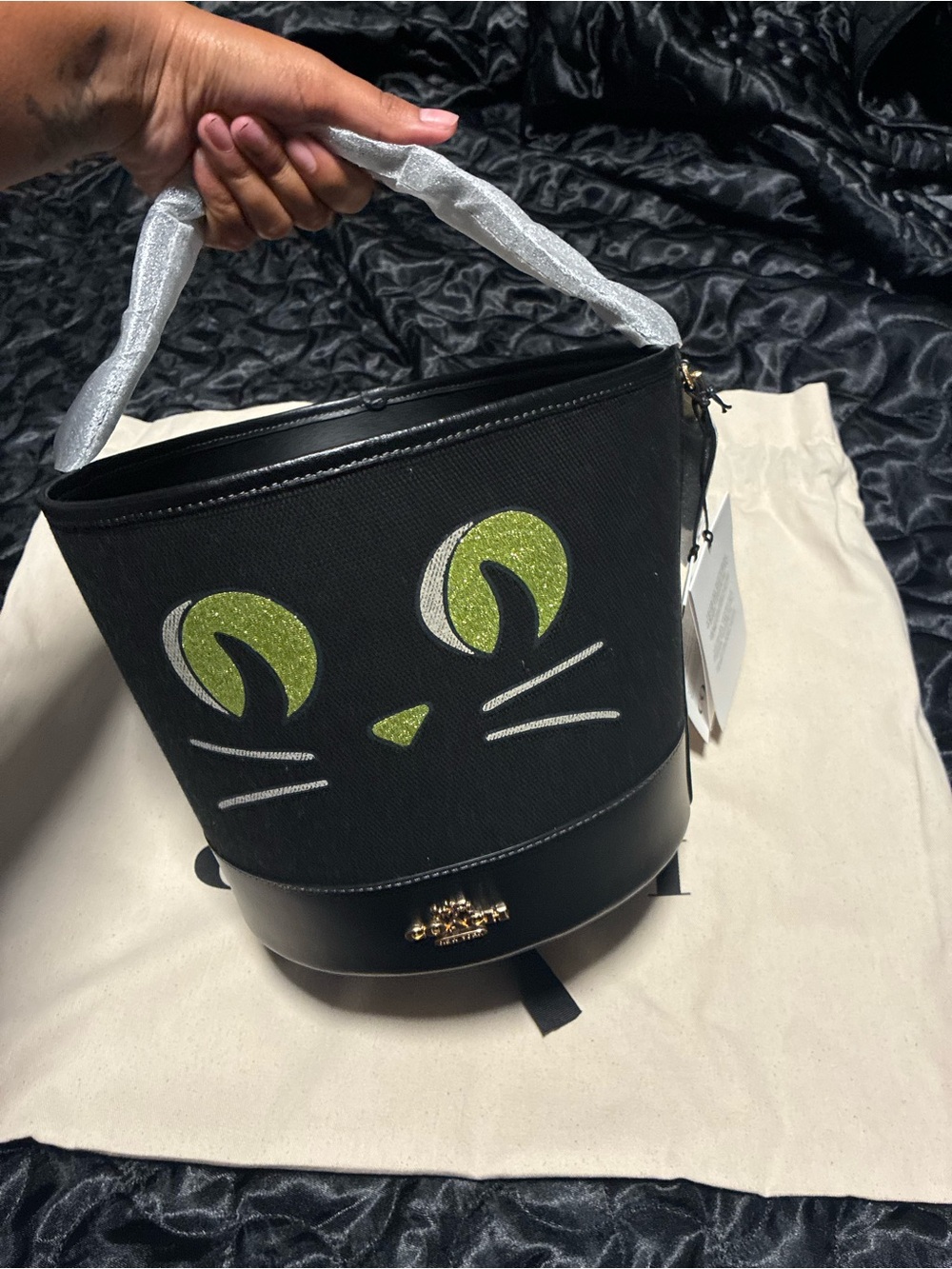 Coach Black Canvas Bucket Bag with Green Cat Face Accents